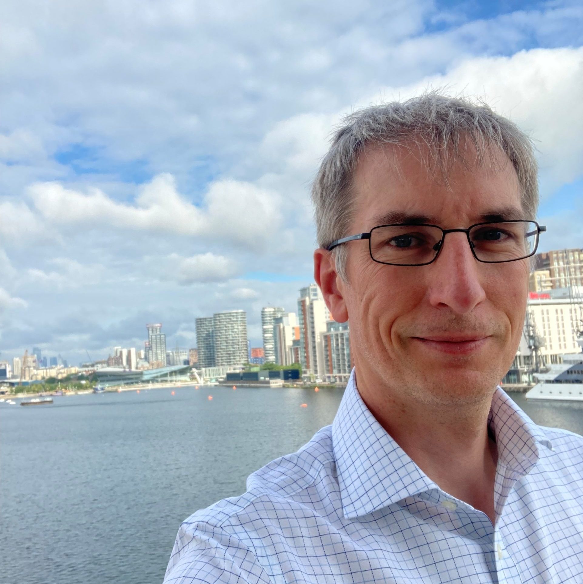 Image of Colin Simpson with London in background